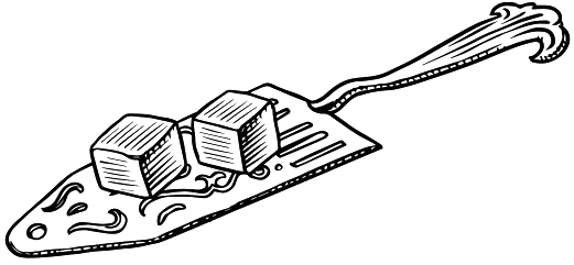 Illustration of a decorative spatula holding two cubes, possibly butter, with swirly designs on the spatula.